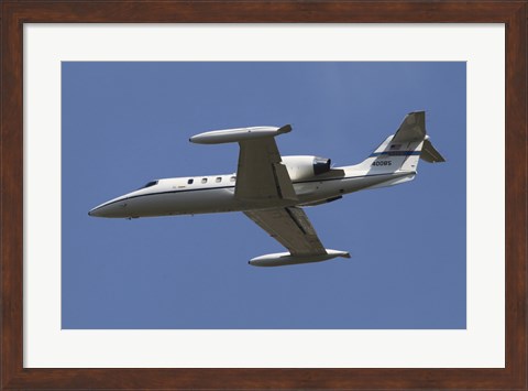 Framed United States Air Forces Europe C-21A Learjet in Flight over Germany Print