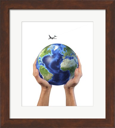 Framed Man&#39;s Hands Holding the Planet Earth, with a Jet Aircraft Flying Above Print