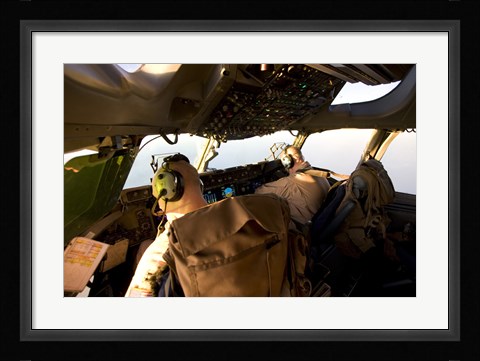 Framed US Army Pilots in-Flight in the Cockpit of a C-17 Globemaster III during a Mission to Qatar Print
