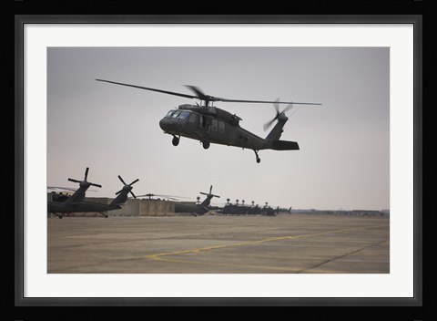 Framed UH-60 Black Hawk Taking off for a Mission Over Northern Iraq Print