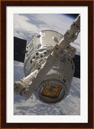 Framed SpaceX Dragon Commercial Cargo Craft during Grappling Operations with Canadarm2 Print