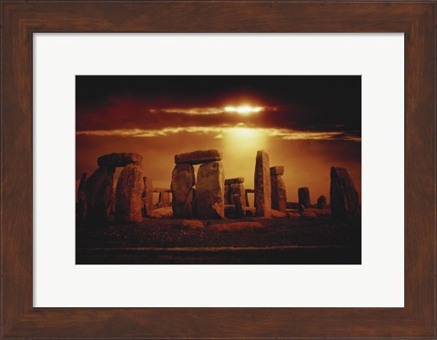 Framed Composite of a Sunset over Stonehenge, Wiltshire, England Print