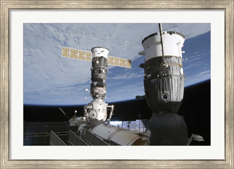 Framed Russian Soyuz and Progress Spacecrafts Docked to the International Space Station Print
