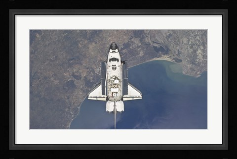 Framed Space Shuttle Atlanti Flying Above the Atlantic coast of Spain and the Gulf of Cadiz Print