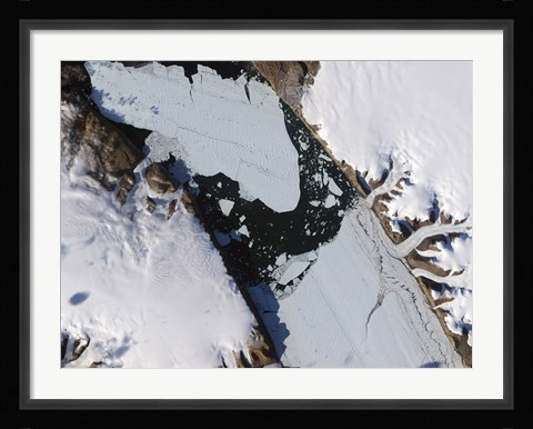 Framed Ice Island that Calved off the Petermann Glacier in Northwestern Greenland Migrates Down the fjord Print