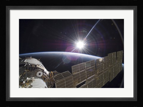 Framed International Space Station Backdropped by the Bright Sun over Earth's Horizon Print