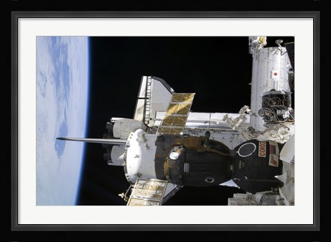 Framed Docked Soyuz Spacecraft over the Docked Space Shuttle Atlantis Print