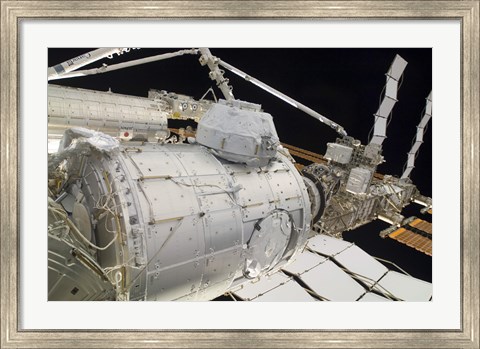 Framed Pressurized Mating Adapter 3 in the Grasp of the Canadarm2 Print