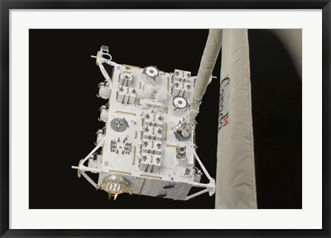 Framed Japanese Experiment Module Exposed Facility in the Grasp of the Shuttle&#39;s Remote Manipulator System Arm Print