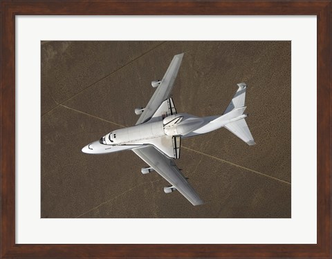Framed overhead view of Atlantis Atop a Modified 747 Aircraft Print