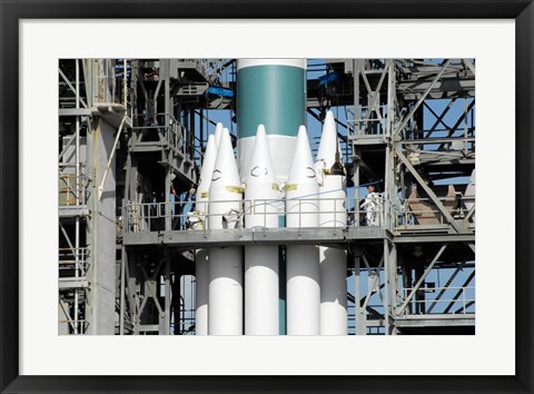Framed Solid Rocket Boosters are Attached to the Delta II Rocket in the Mobile Service Tower Print