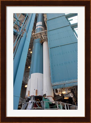 Framed Second Solid Rocket Motor is Moved into Place Alongside the Delta II First Stage Print