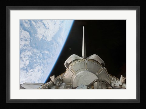 Framed Space Shuttle Discovery's Payload Bay Backdropped by Earth's Horizon Print