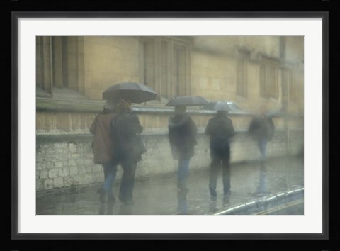 Framed Walking in the rain, Oxford University, England Print