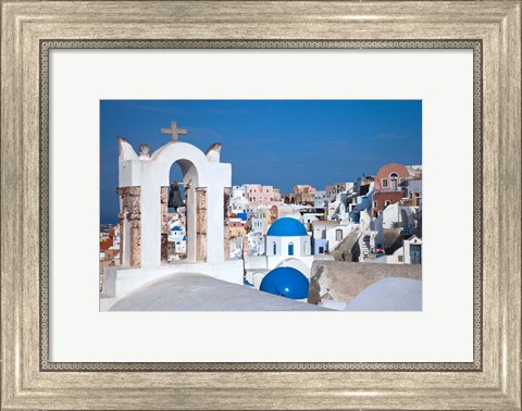 Framed Bell tower and blue domes of church in village of Oia, Santorini, Greece Print