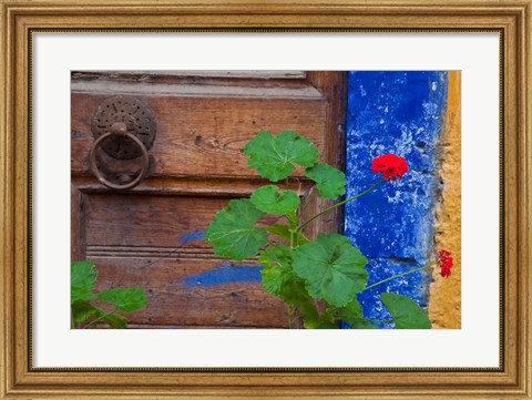 Framed Geraniums and old door in Chania, Crete, Greece Print