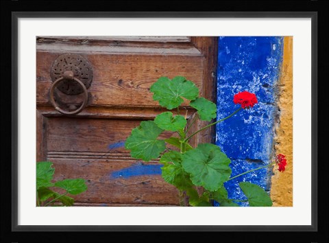 Framed Geraniums and old door in Chania, Crete, Greece Print