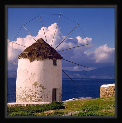 Framed Greece, Mykonos, Windmill looks over Azure Sea Print