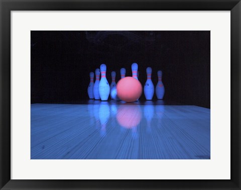 Framed Bowling ball with bowling pins Print