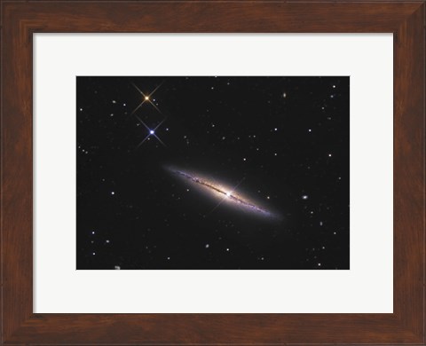 Framed NGC 4013 is an edge-on unbarred spiral galaxy in the Constellation Ursa Major Print