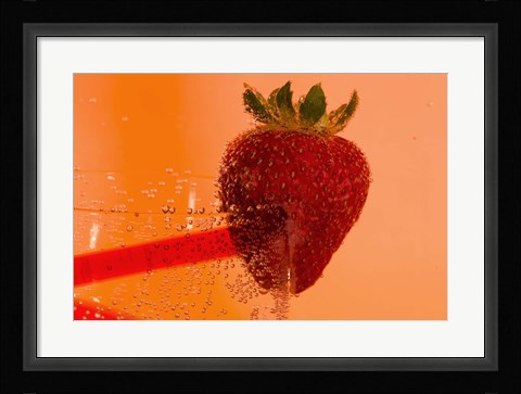 Framed Strawberry On Red Swirl Glass Print