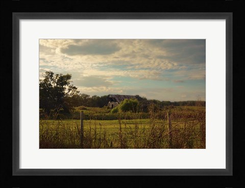 Framed Rusty Barn At Sunset Print
