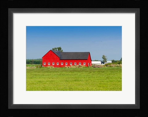 Framed Red barn in Grenville County in Ontario, Canada Print