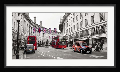 Framed Buses and taxis in Oxford Street, London Print
