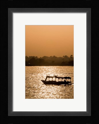 Framed Egypt, Luxor Water taxi at sunset Nile River Print