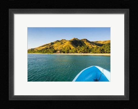 Framed Blue boat cruising through the Yasawa, Fiji, South Pacific Print
