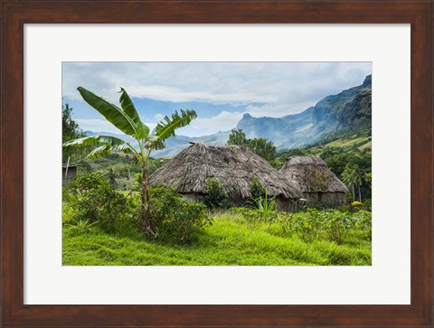Framed Traditional thatched roofed huts in Navala, Fiji Print
