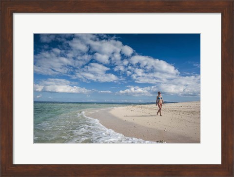Framed Woman walking on white sand beach of Beachcomber Island, Mamanucas Islands, Fiji Print