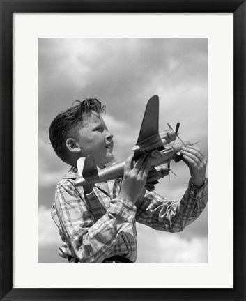 Framed 1930s 1940s 1950s  Freckle-Faced Boy Holding Airplane Print