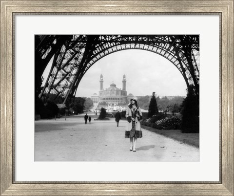 Framed 1920s Woman Walking Under The Eiffel Tower Print