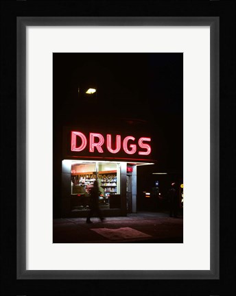 Framed 1980s Drug Store At Night Pink Neon Sign Print