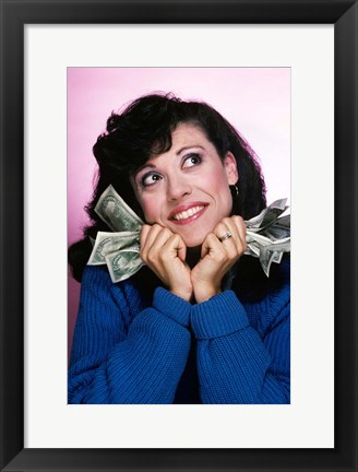 Framed Excited Brunette Woman Holding Several Dollar Bills Print