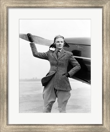 Framed 1930s Woman Aviator Pilot Standing Next To Airplane Print