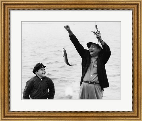 Framed 1950s 1960s Boy Fishing With Father Or Grandfather Print