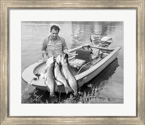 Framed 1970s Man In Small Motorboat Print