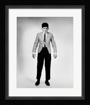 Framed 1950s 1960s Overgrown Boy Looking At Camera Print