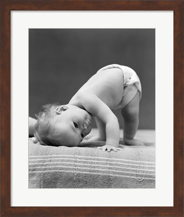 Framed 1940s Baby Bending Down With Head On Blanket Print