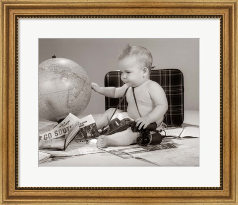Framed 1960s Baby Seated Looking At Globe Print