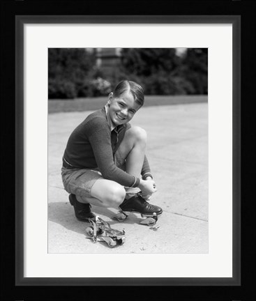 Framed 1930s Smiling Boy Fastening On Metal Roller Skates Print