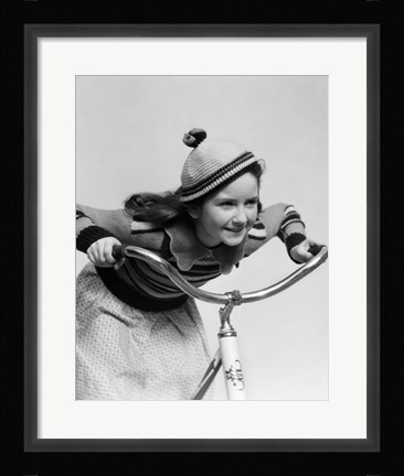 Framed 1930s Smiling Eager Little Girl In Knit Cap And Sweater Riding Bike Print