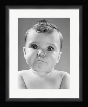 Framed 1950s Baby Making Funny Face With Eyes Wide Open Print