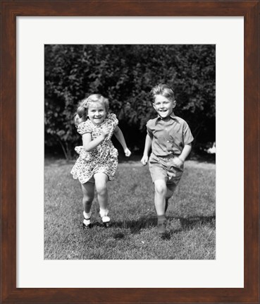 Framed 1930s 1940s Boy And Girl Running In Backyard Print