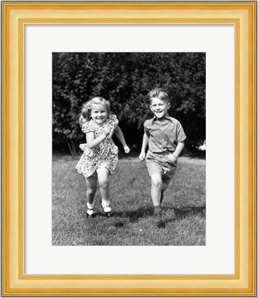 Framed 1930s 1940s Boy And Girl Running In Backyard Print